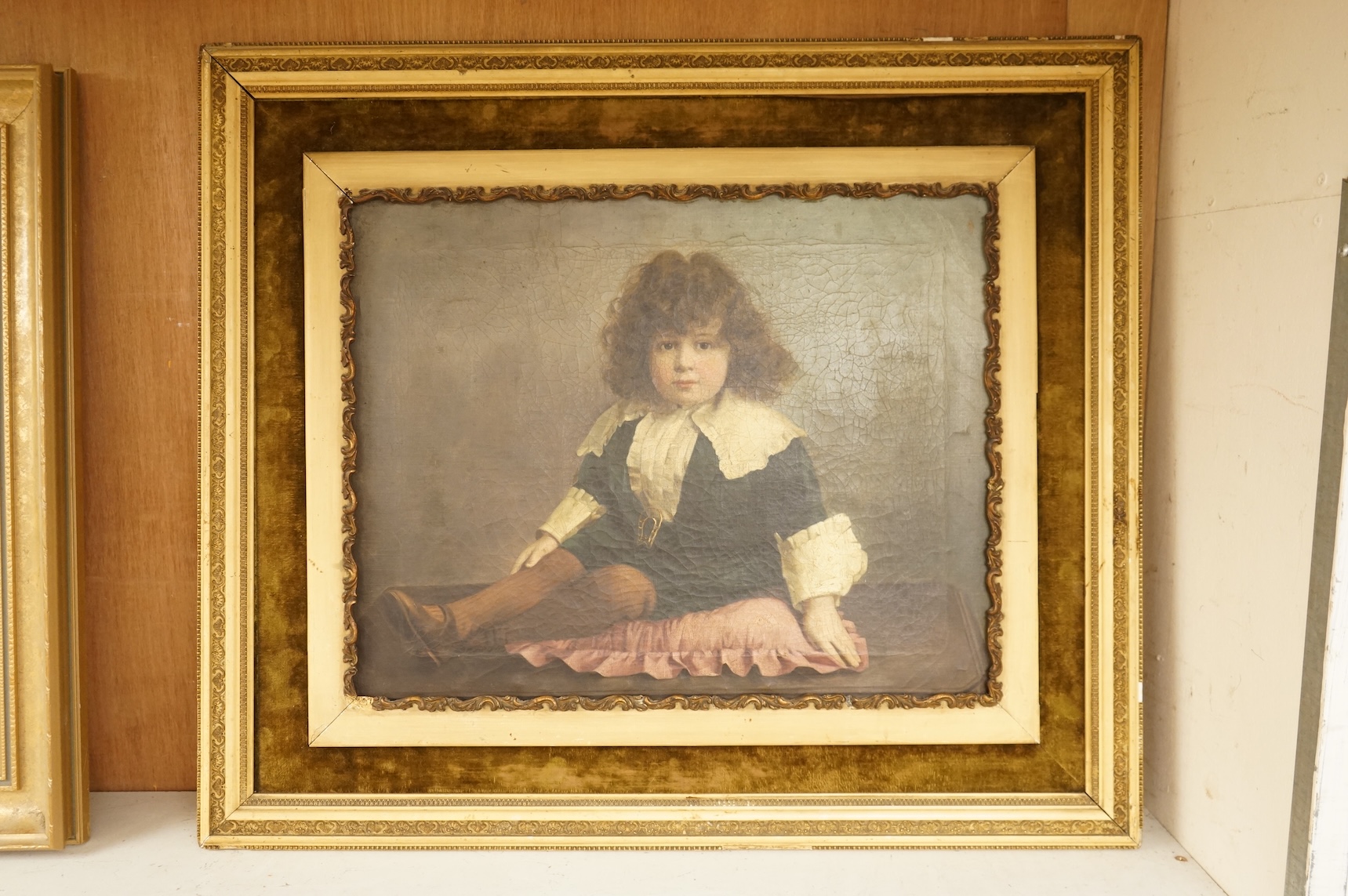 Mid Victorian School, Portrait of a seated child, unsigned, oil on canvas, 39 x 49cm
